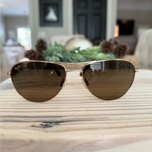 Genuine Maui Jim sunglasses. Aviator style, gold. Used excellent condition.